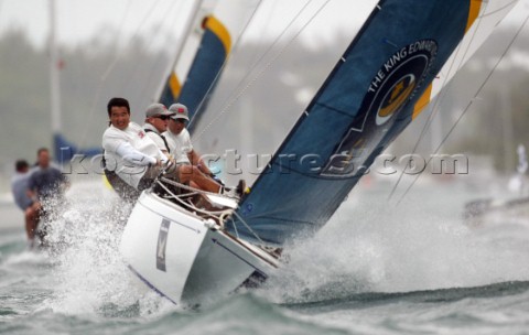 In wind of 2025 knots Australias Peter Gilmour of PizzaLa Sailing Team leads New Zealands Chris Dick