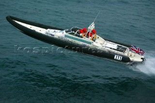 Powerboat P1 Team Eraser II in totally committed flight on their way to victory at the Grand Prix of Tunisia 2004