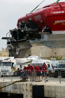 28/5/04.Valletta, Malta:Crews look on as boats are lifted in and out for testing in Valletta Harbour