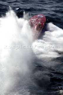 29/5/04.Vallette. Malta: OSG Donzi Racing, dug deep into the waves as they turned the first mark, with American Doug Valentine, throttle man takes the boat through difficult conditions to take 2nd.