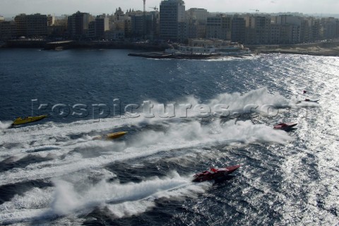 29504Vallette Malta Its a flying start as the boat take off the start line at Sliema Point to their 