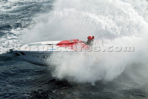 29504Vallette Malta SuperSport class from Italy Angelo Tedeschi negotiates the big waves off Sliema 