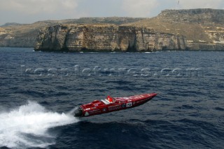 30/5/04 Valletta, Malta: Thuraya powers round the scenic Island of Malta to take the over winners trophy for the first Powerboat P1 series.