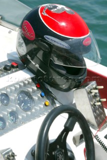 METAMECCANICAHelmet of driver Marco Pennesi resting on boats dashboard.