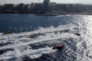 Aerial shot of powerboat fleet racing towards Valletta harbour, Malta