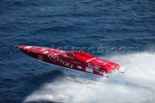 P1 powerboat launches off a wave during racing in Malta