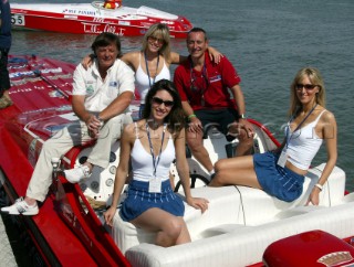 19.06.04 Fiumicino Rome: The P1 promotions girls get a taste of powerboat life as they step aboard the winning boat Thuraya with Adriana Panatta