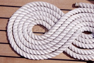 Coiled rope on deck of classic yacht