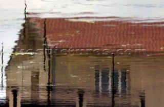 Colourful reflections in water of buildings and architecture in southern France