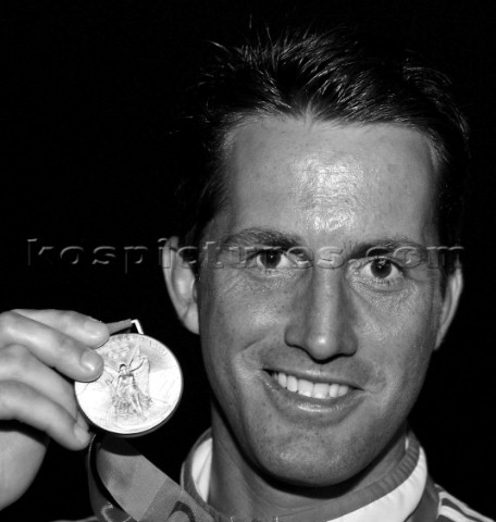 2004 OLYMPIC GAMES mens finn Ben Ainslie with gold medal