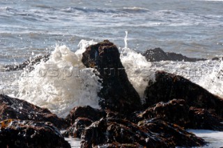 Wave crashes over rock on St Margarets Bay, Dover Kent