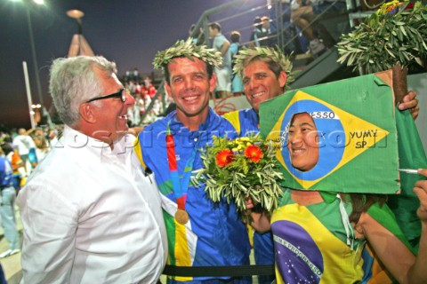 Athens 28 08 2004 Olympic Games 2004   Star Prada Chairman PATRIZIO BERTELLI with TORBEN GRAEL  MARC