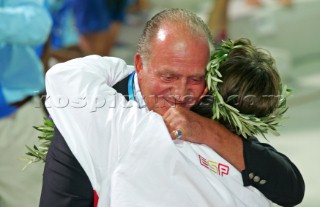 Athens 26 08 2004. Olympic Games 2004  . 49 er. King of Spain Juan©Carlos hugs IKER MARTINEZ (ESP). Gold Medal