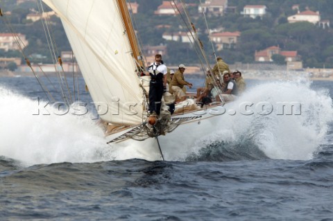 Spray off the bow of a classic yacht in choppy seas during the Voiles de St Tropez 2004