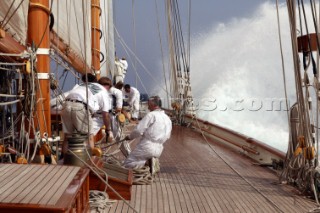 Big spray off the bow on board classic yacht Eleanora during the Voiles de St Tropez 2004