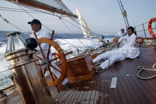 Helmsman and crew on aft deck of classic yacht Eleanora during the Voiles de St Tropez 2004