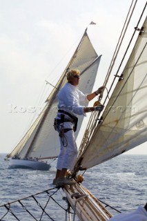 Bowman on bowsprit of classic yacht Eleanora
