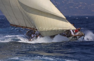 Classic yacht powers through choppy seas in St Tropez