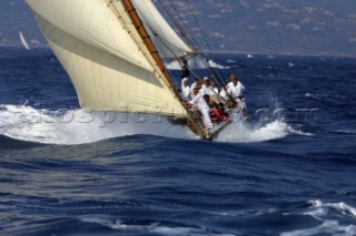 Classic yacht powers through choppy sea in St Tropez