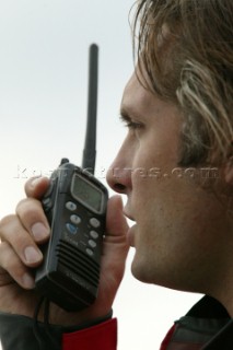 Man using an ICOM VHF handheld radio
