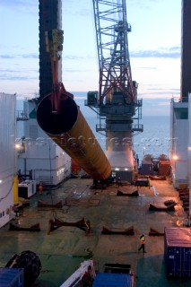 Construction of Windfarm on the Kentish flats in the Thames estuary off Whitstble Kent. Onboard the construction ship Resolution during the foundation process, where the Monopile is hammered in to the seabed with a hydraulic hammer and the transition piece lowered onto the monopile