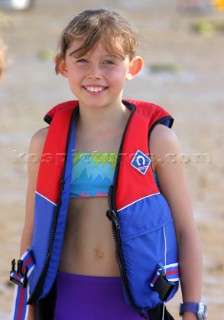 Young girl wearing lifejacket