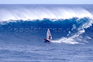 Windsurfer on huge wave