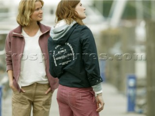 Two girls standing on dockside