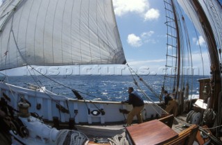 Crew members on the foredeck of tall ship Belle Poule