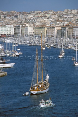 Yacht entering Marseilles harbour France