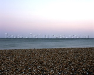 Pebble beach at sunset, Worthing, West Sussex