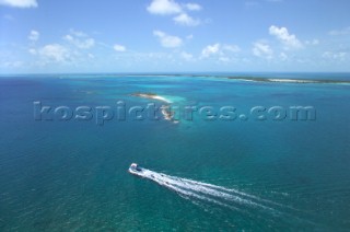 Power boat heading out to sea in Caribbean