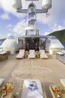 Sun loungers on aft deck of superyacht