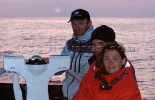 Skipper David Scully, crew Dingo Rolfe and Claire Bailey on Cheyenne