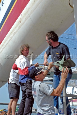 Crewmen Herve Jan Mark Featherstone Gerard Navarin taking out propeller Cheyenne