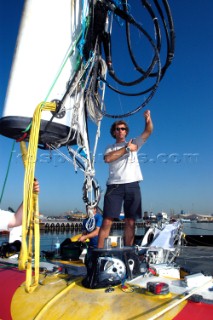 Rigger Ed Danby directing crane to replace mast Cheyenne