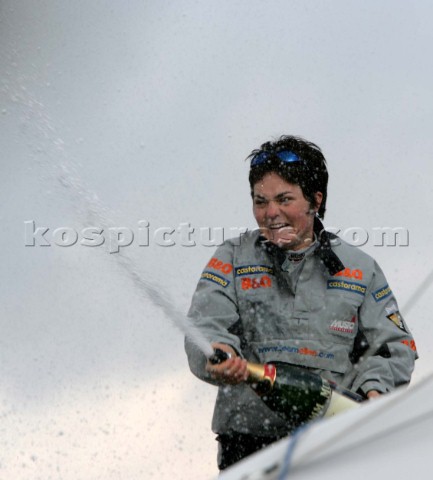 Ellen MacArthur of trimaran BQ winning the round the world solo sailing record of 71 days 14 hours a