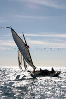 Gaff cutter sailing inshore
