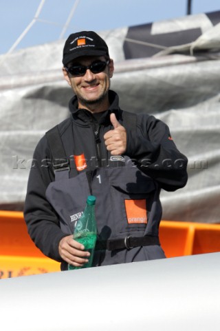 Arrival of maxi cat Orange skippered by Bruno Peyron in Brest at the end of the successful Jules Ver