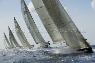 Fleet of Swan yachts racing up wind in a line