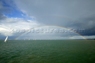 Rainbow over yachts racing in the Solent, UK