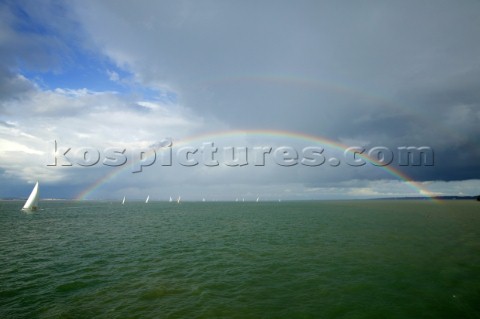 Rainbow over yachts racing in the Solent UK
