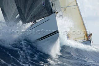 Bow of Swan yacht punching through wave