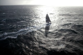 Vendee Globe Open 60 yacht Hugo Boss skippered by Alex Thomson sailing in rough water and strong breeze