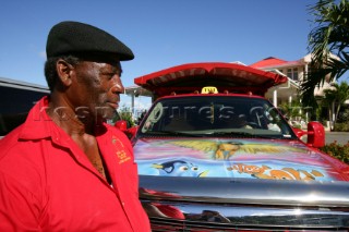 Tortola Island - British Virgin Islands - CaribbeanRoad Town, capital of BVI -The colourful taxis of the Island and the owner