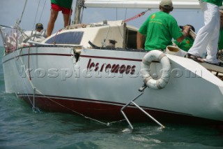Aftermath of collision between LES REMOUS (pictured) and ALA MOR at the first mark, second day of Angostura Tobago Sail Week 2005.