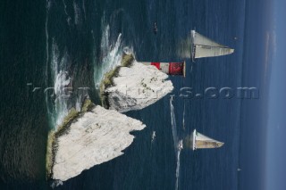 Super maxi Maximus rounding the famous Needles rocks during The 2005 JP Morgan Asset Management Round the Island Race.