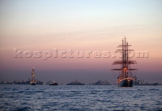 Square rigger at anchor with Trafalgar 200 fleet in background