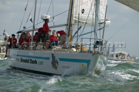Simon Le Bon of Duran Duran sails his maxi yacht Arnold Clark Drum across the startline of the Fastn