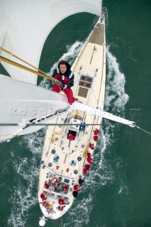 Simon Le Bon climbing the mast of Arnold Clarke Drum before the start of the Rolex Fastnet Race 2005